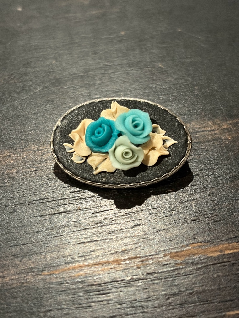 Floral clay brooch